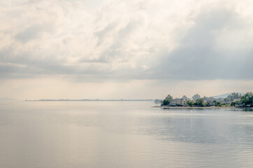 Evia island, Greece - June 28. 2020: Panorama of the Greek island of Evia from the ferry 
