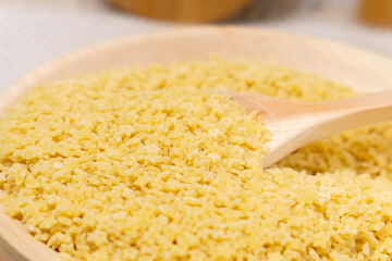 Ingredients for Italian pasta with tiny stelline pasta usually used in soups. close up