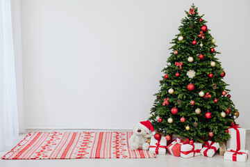 Christmas tree pine with gifts for the new year decor background place for the inscription