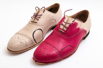 Rough preliminary mock-up of shoes for a client, markup for future design and paint testing