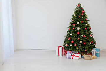 Christmas tree pine with gifts for the new year decor background place for inscription