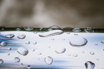 Water drops on a fence