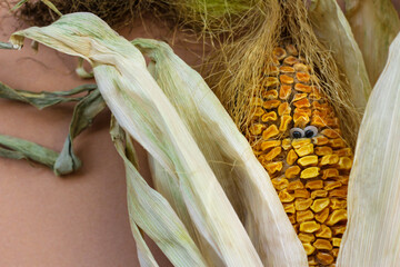 dried corn with eyes. the concept of improper food storage, humor, and horror