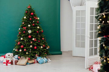 Christmas tree pine with gifts for the new year green decor winter