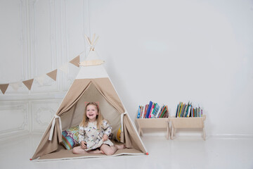 child playing in the living room © Alexander