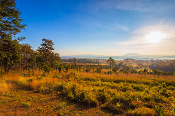 Fototapeta na wymiar Hill and Sunrise at Dusita viewpoint in Thung Salaeng Luang National Park, Phitsanulok, Thailand