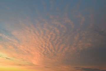 Blue sky in sunset. Dramatic sunset and sunrise sky. Blue sky with clouds Fiery orange sunset sky. Beautiful sky