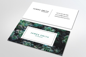 Elegant business card with palm leaves, white green black