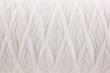 Roll of white rope water filter close up isolated on white background
