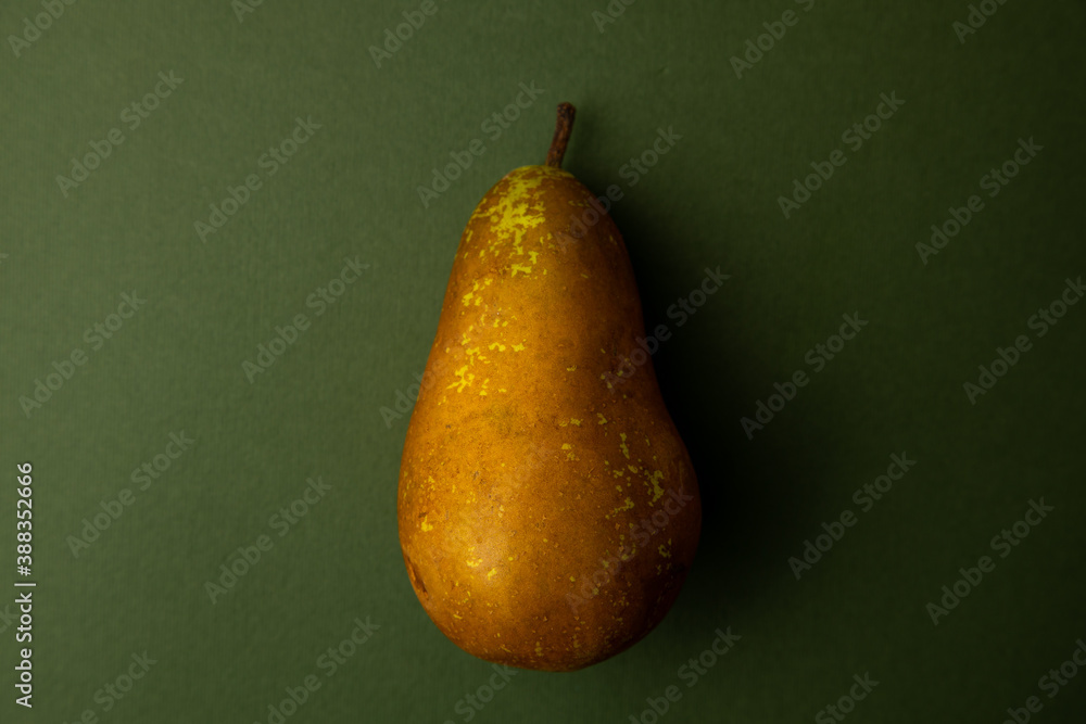 Wall mural conference pear, on green background