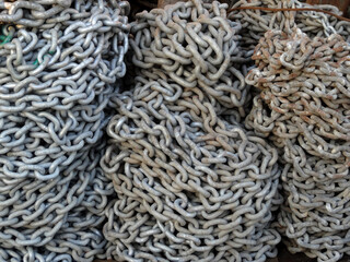 Piles of used, rusty chains.