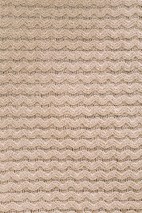 Knitted texture background. Knitting pattern of wool. Knitting. Texture of woolen fabric for wallpaper and abstract background.
