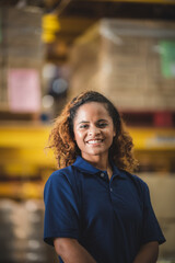 Portrait of African American worker in warehouse, International export business concept