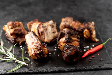 grilled beef ribs on a stone background  with copy space for your text