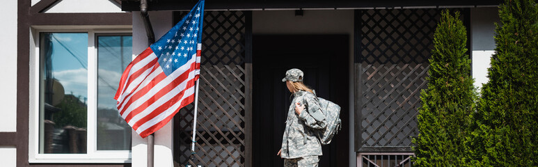 Military servicewoman with backpack leaving house, standing on threshold, banner