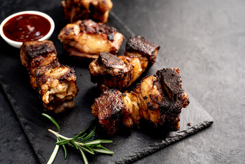 grilled beef ribs on a stone background