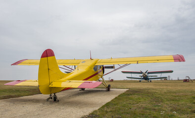 An old little plane on a small village airfield