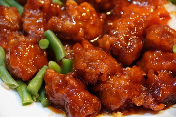 General Tsao chicken in red sauce with green beans