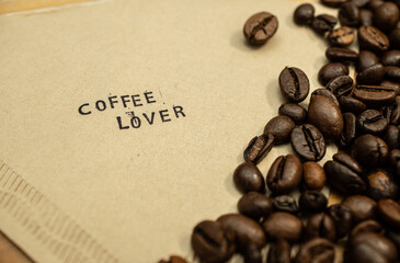 coffee lover slogan on coffee filter with stamps and beans