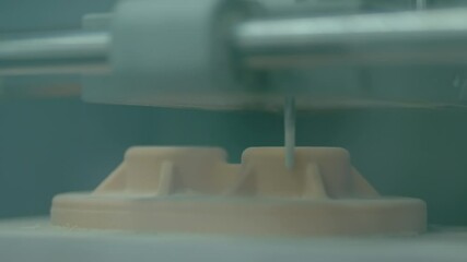 Automated milling machine cutting wooden workpiece from wood pulp, making 3d model at technology exhibition, factory - close up. Woodworking, CNC engraving, carving, industrial, manufacturing concept