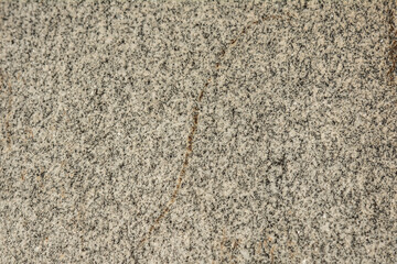 The texture of natural stone is gray.