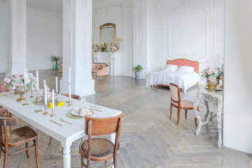 royal baroque style luxury posh interior of large room. extra white, full of day light. high ceiling and walls decorated by stucco