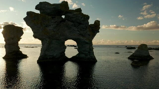 Rauks sea stacks, limestones, in Gotland, Sweden, aerial view during sunset