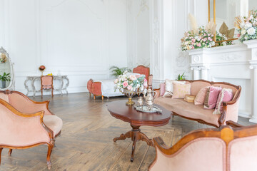 royal baroque style luxury posh interior of large room. extra white, full of day light. high ceiling and walls decorated by stucco