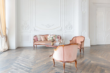 royal baroque style luxury posh interior of large room. extra white, full of day light. high...