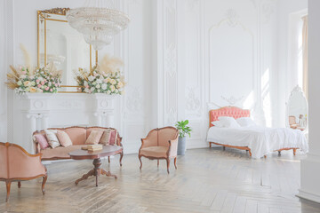 royal baroque style luxury posh interior of large room. extra white, full of day light. high ceiling and walls decorated by stucco