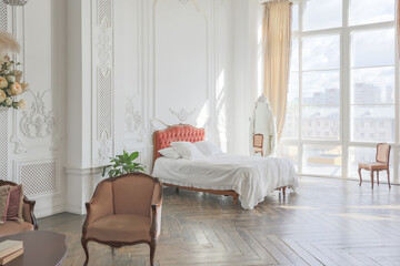 royal baroque style luxury posh interior of large room. extra white, full of day light. high ceiling and walls decorated by stucco