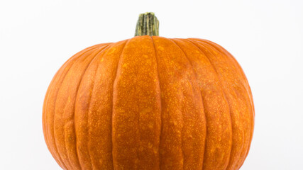 Halloween pumpkin on a white background. Ripe orange pumpkin on a white background. Fresh organic pumpkin on a white background.