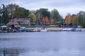 Fototapeta premium Calm water in the Zülpich lake on a cloudy day, Zülpich Germany