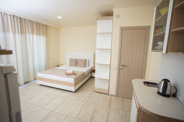The room has a bed wardrobe
