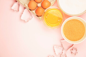 Products and dishes on a pink background