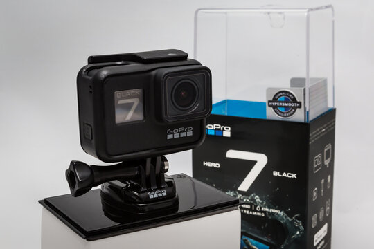 Moscow. November 2018.  GoPro HERO 7 Black in original packaging front and side view. The action camera with new feature fuctions hypersmooth, Live stream, TimeWarp and SuperPhoto.