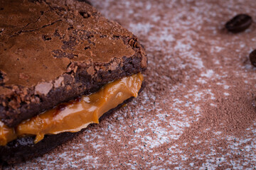 Chocolate brownie with delicious dulce de letche filling. Closeup photography.