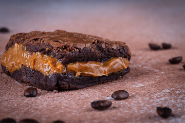 Chocolate brownie with delicious dulce de letche filling. Closeup photography.