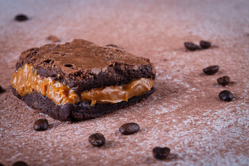 Chocolate brownie with delicious dulce de letche filling. Closeup photography.