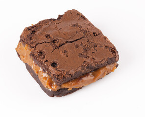 Chocolate brownie with delicious dulce de letche filling. Closeup photography.