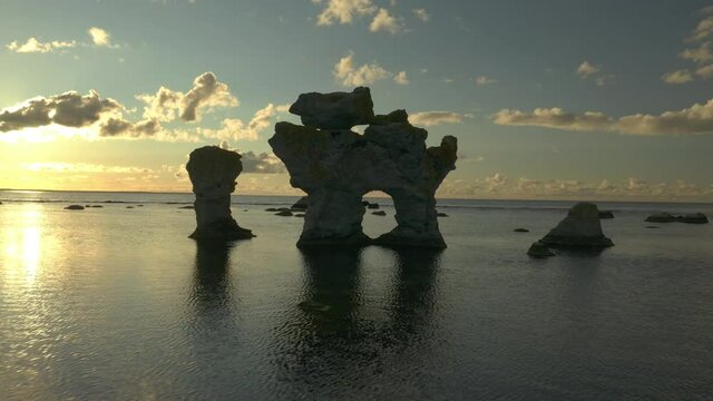 Rauks sea stacks, limestones, in Gotland, Sweden, aerial view during sunset