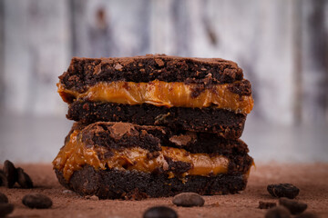 Chocolate brownie with delicious dulce de letche filling. Closeup photography.