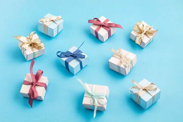 Christmas gift boxes on blue background. Winter holidays gift list, seasonal shopping