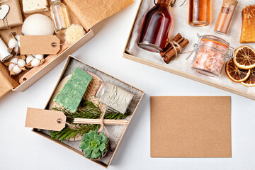 Naklejka na ściany i meble Preparing self care package, seasonal gift box with plastic free zero waste cosmetics products