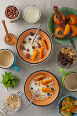 Healthy breakfast oatmeal and fruits, top view