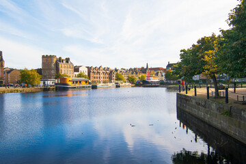 A viw of The Shore area of Leith, Edinburgh, UK, as seen from the west end of the old Victoria swing bridge. - 388378686