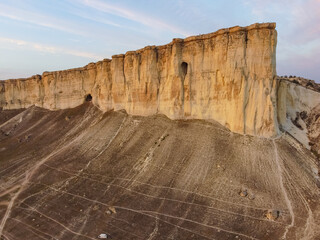 White rock in the Crimea. White rock Sights of Crimea. High rock Rocky mountain. White rock against a beautiful sunset