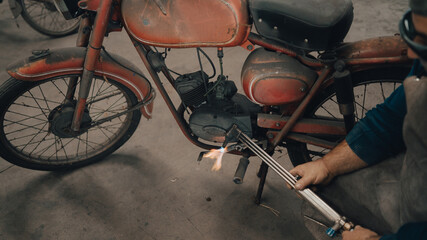 mechanical workshop with vintage motorcycle