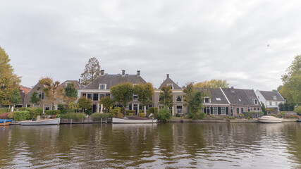 Fototapeta na wymiar The Vecht river flowing through Vreeland, the Netherlands