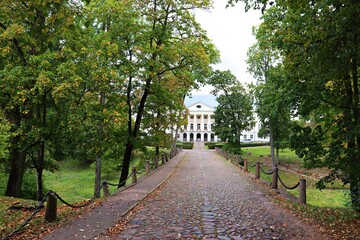 Very old stone bridge in the park next to the Manor in the Latvian Kazdanga in October 2020